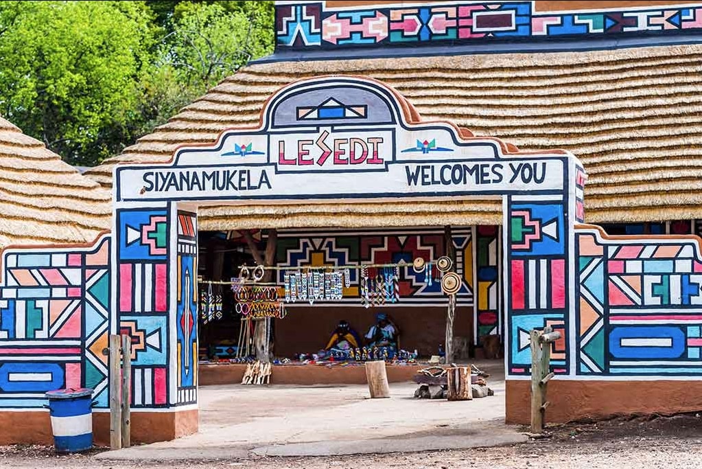 Visit Lesedi Cultural Village.